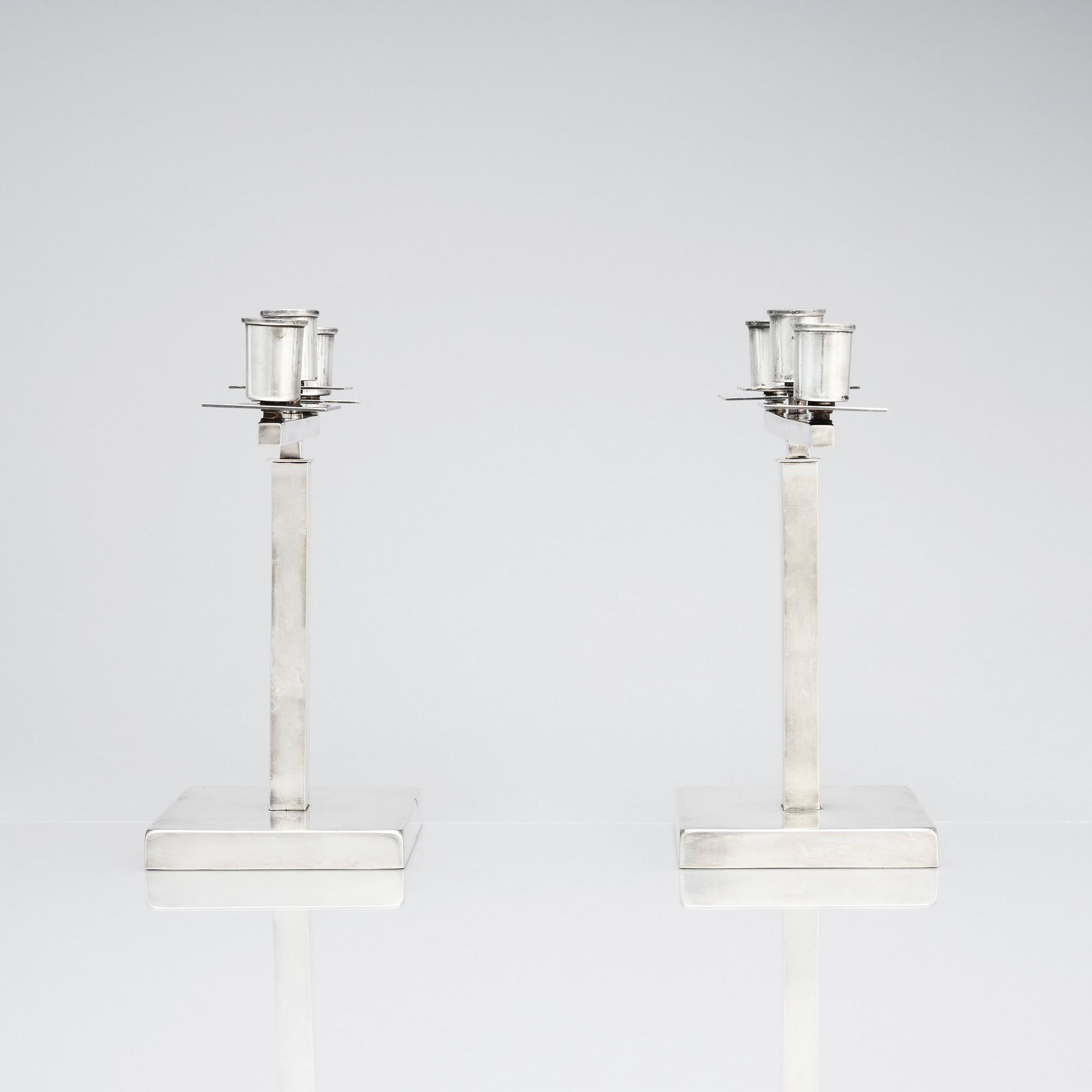 Rolf Engströmer, attributed to, a pair of silver plated candelabra, Fabriksaktiebolaget Kronsilver, Sweden 1930s.