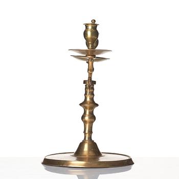 A baroque brass two-branch candelabra, Northern Europe/Sweden, 17th century.