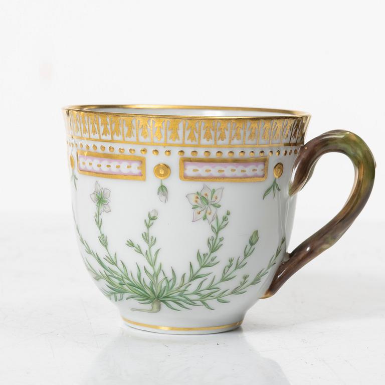 A Royal Copenhagen 'Flora Danica' coffee cup with stand, Denmark, 20th Century.