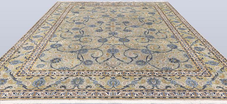 A Royal Keshan carpet, signed, 410 x 307 cm.