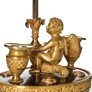 A Russian Empire ormolu and patinated bronse two-light lamp, early 19th century.