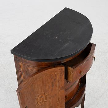 A small cabinet with drawers from around the year 1900.