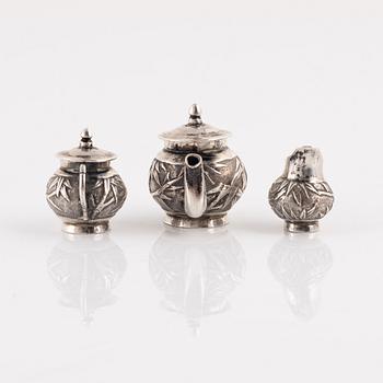 A Japanese Silver Minature Tea Service, probably early 20th Century, (3 pieces).