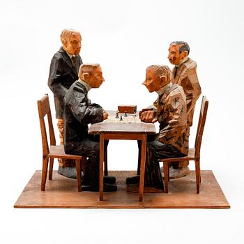 AXEL PETERSSON DÖDERHULTARN, sculpture group, partially painted carved wood, Chess players, stamp signed.