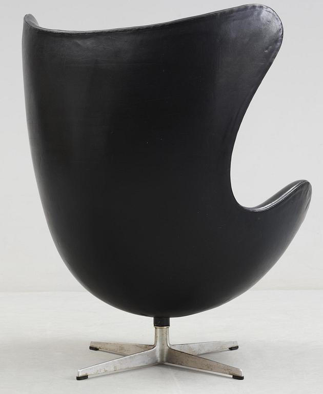 An Arne Jacobsen black leather 'Egg' chair, Fritz Hansen, Denmark 1966.