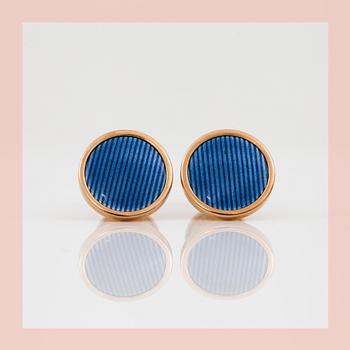 CUFFLINKS with blue enamel.