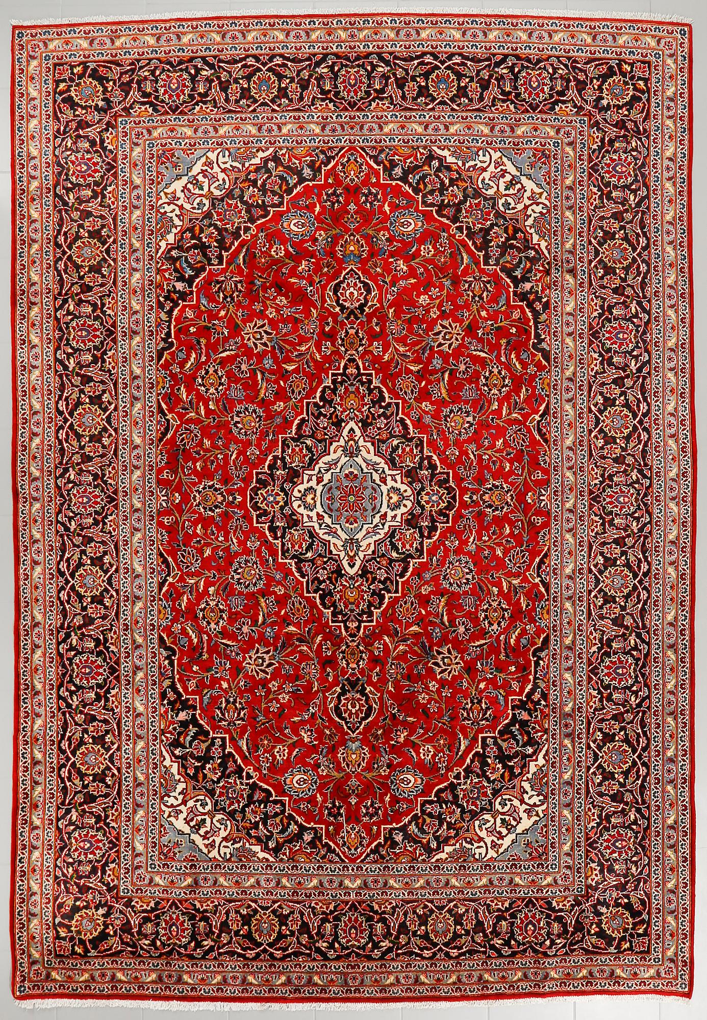 A Keshan rug, 345 x 236 cm.