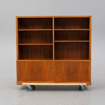 CARL MALMSTEN, a mahogany bookshelf.