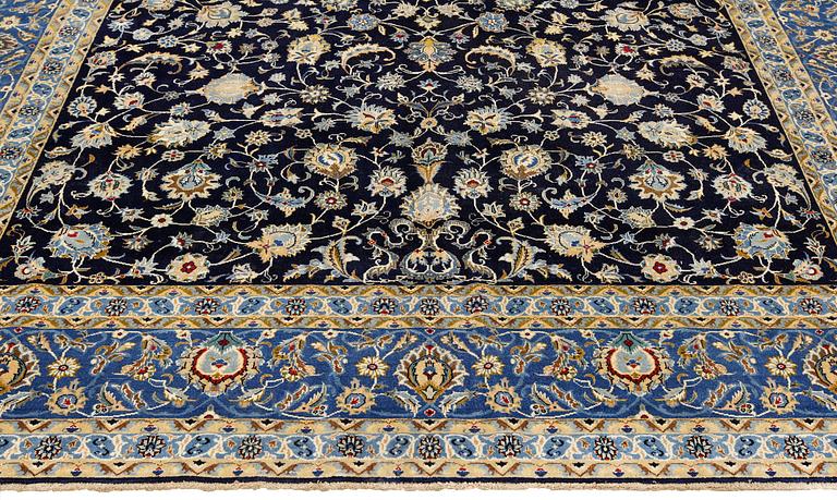 A Kashan carpet of 'Shah Abbas' design, c 376 x 276 cm.