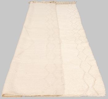 A moroccan carpet, ca 250 x 168 cm.