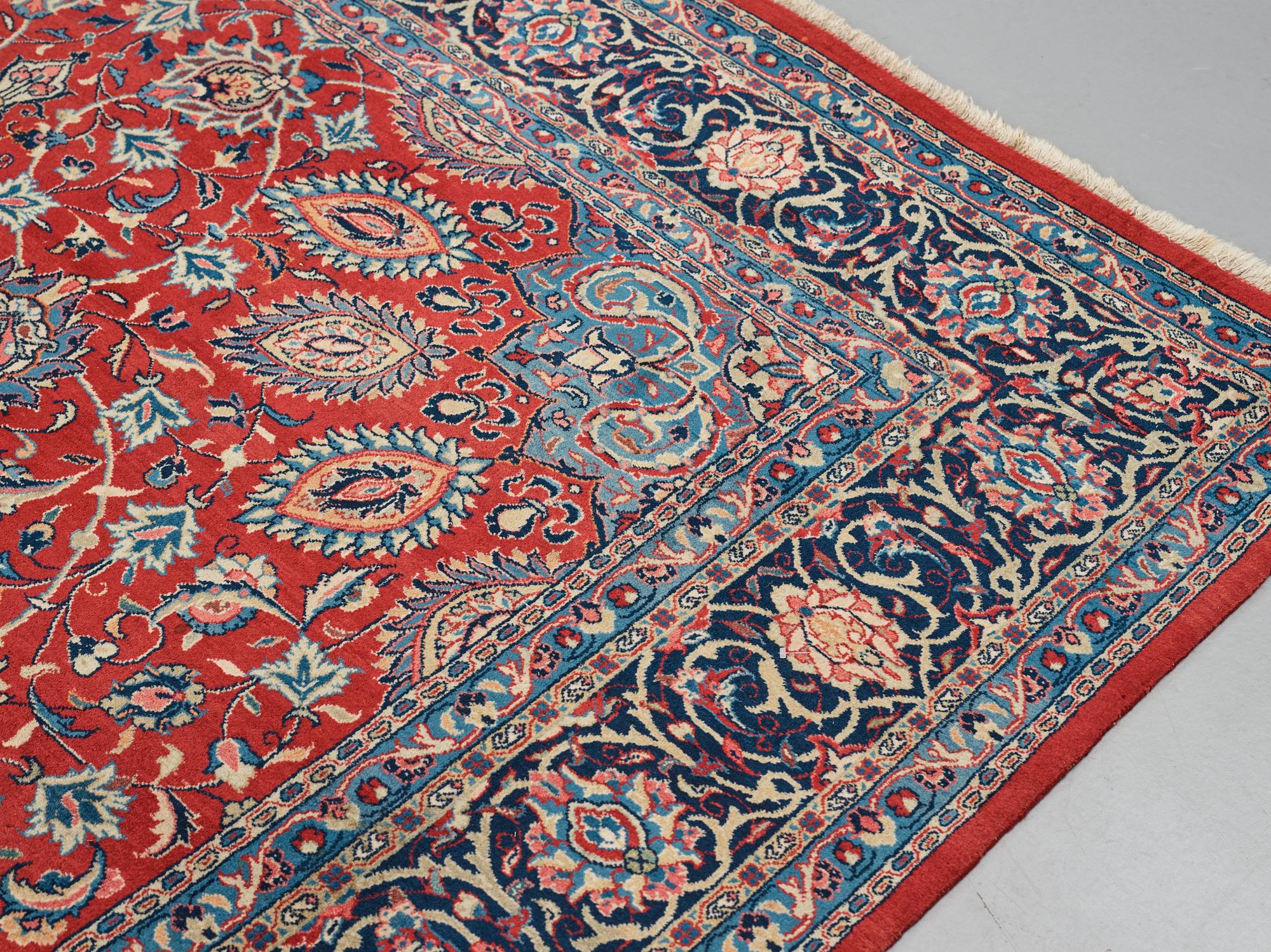 A carpet, a semi-antique/an old Persian, probably a Qazvin, ca 345-349 x 251,5-253 cm.