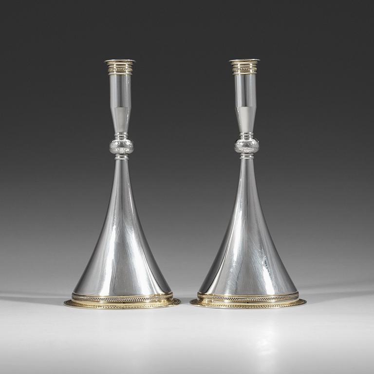 A pair of Wiwen Nilsson sterling 'byzantine style' candlesticks, Lund Sweden 1950.