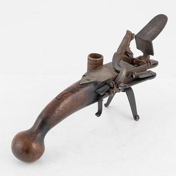 A 18th Century Flintlock lighter.