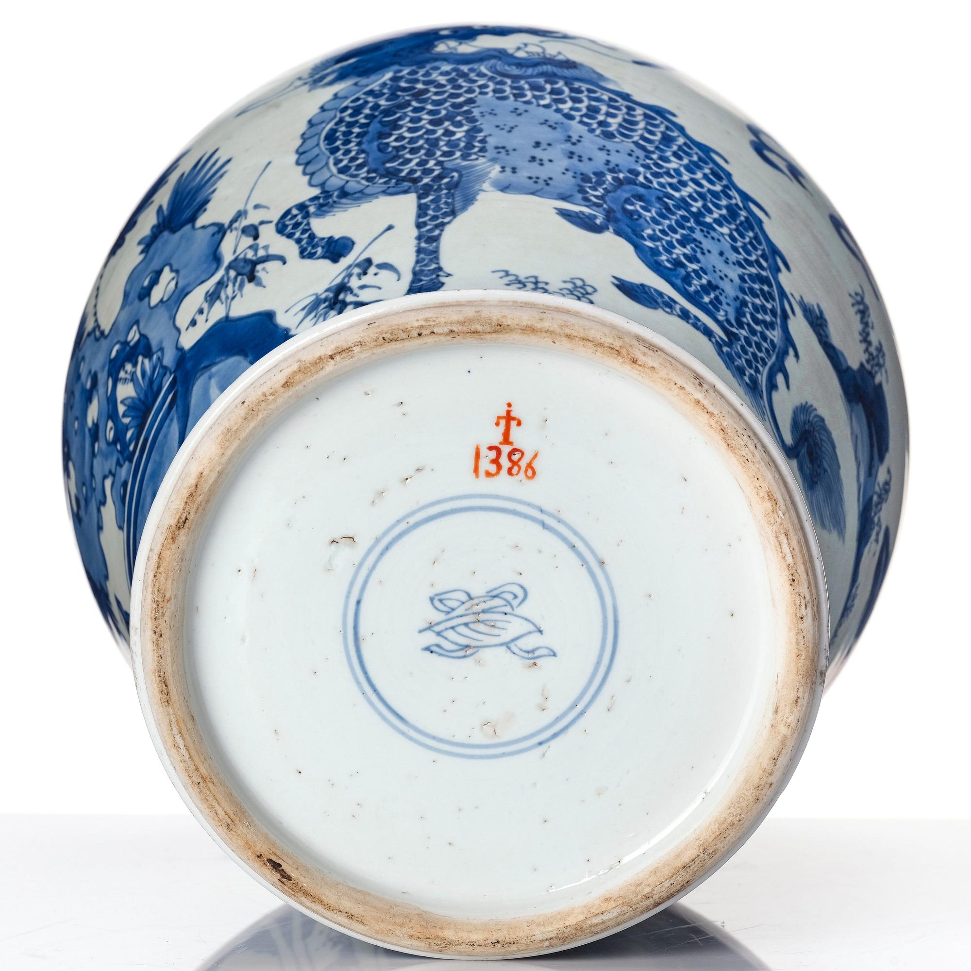 A Transtional blue and white baluster jar with cover, 17th Century.