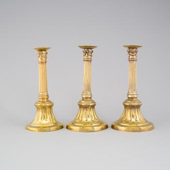 Three French late 18th century candle holders.