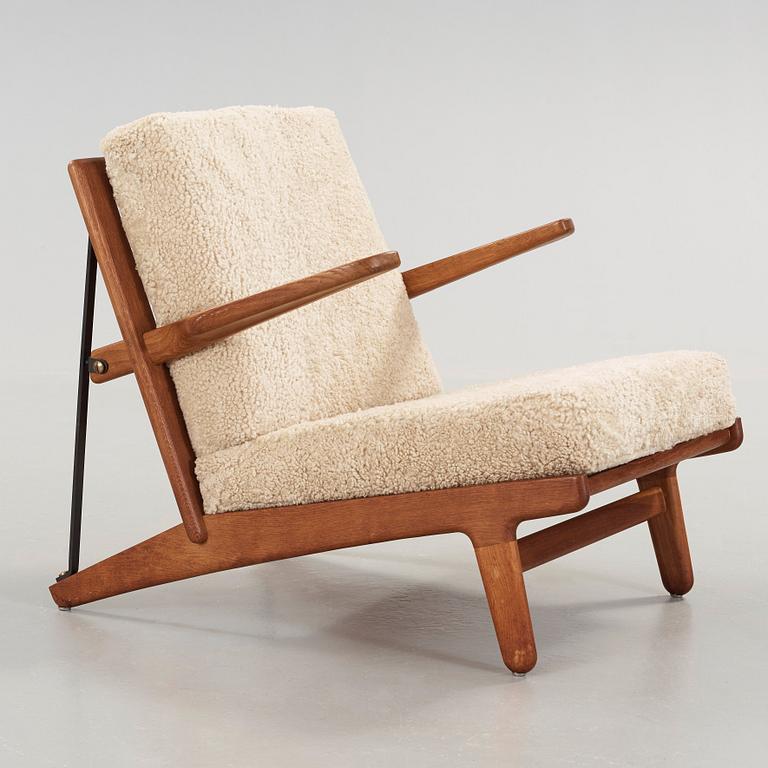 Børge Mogensen, an oak and iron easy chair, Fredericia, Denmark 1950's.
