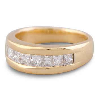 A RING, princess cut diamonds, 18K gold.