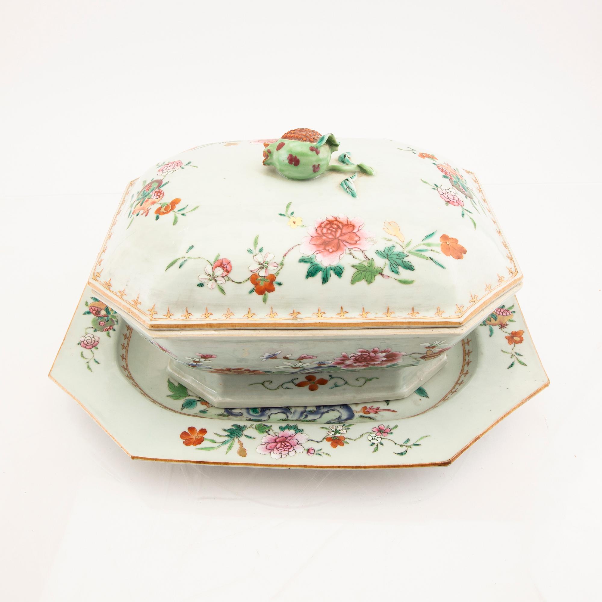 A Chinese famille rose tureen with cover and plate later part of the 18th century.