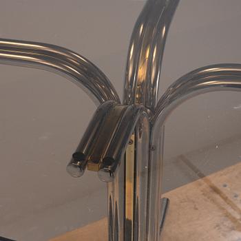 An iIalian glass top dining table, 1970's/80's.