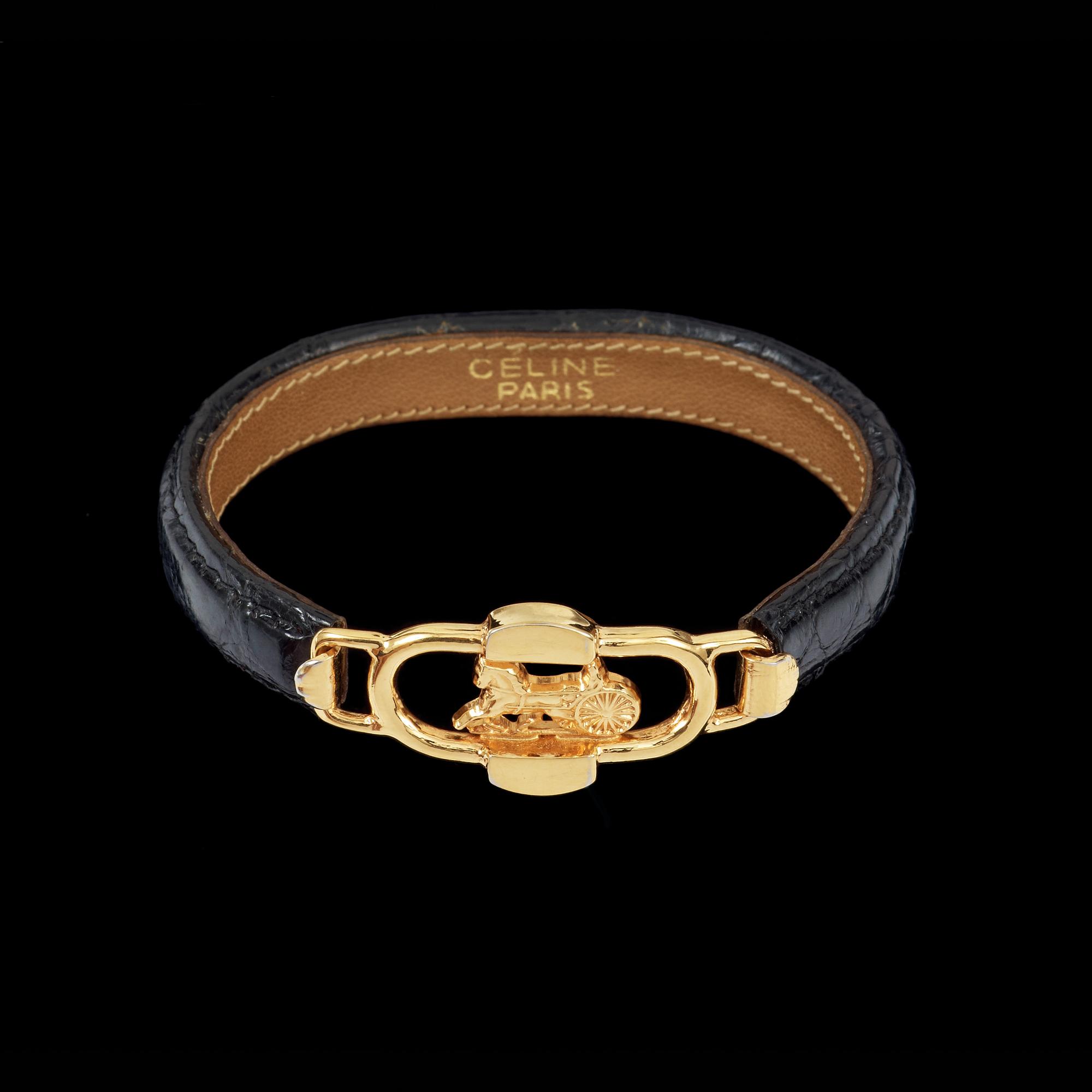 A black bracelet by Celine.