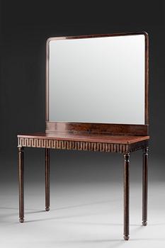 450. An Axel-Einar Hjorth stained birch console table with mirror, 'Coolidge' by NK 1927.