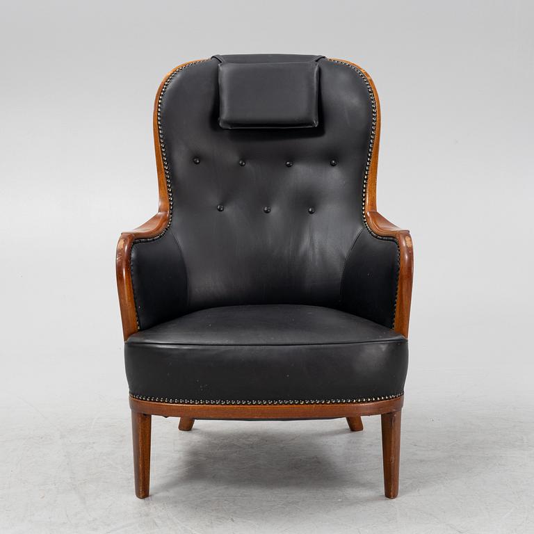 Carl Malmsten, a mahogany 'Advokaten' armchair.