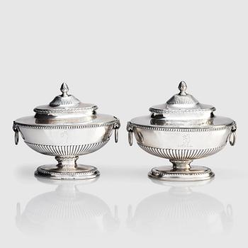 An English pair of sauce tureens with covers, mark of Andrew Fogelberg, London 1774.