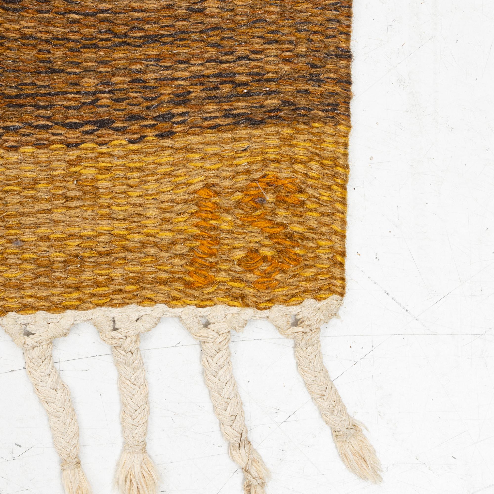 Ingegerd Silow, a flat weave rug, signed IS, c. 225 x 168 cm.