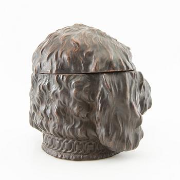 Tobacco tin, early 20th century.