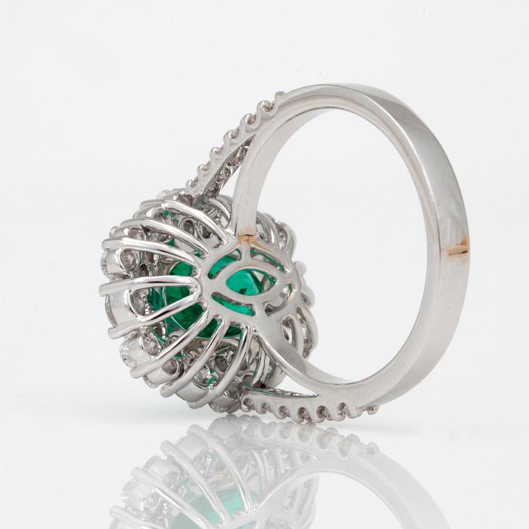 A 3.32ct Colombian emerald 'minor oil' and brilliant-cut diamond ring.