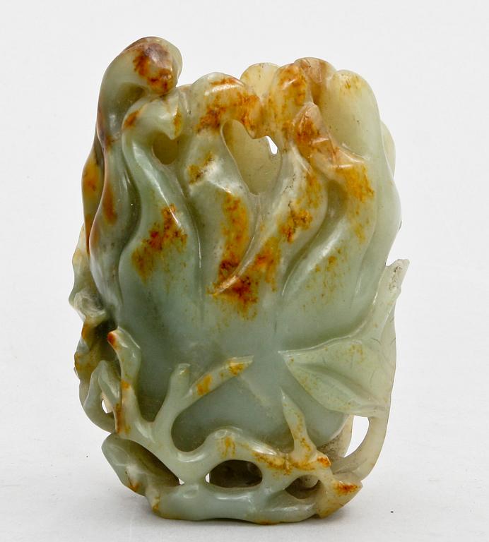 A Chinese nephrite figure of a finger citron.