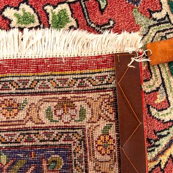 A semiantique Tabriz carpet ca 370x296 cm.