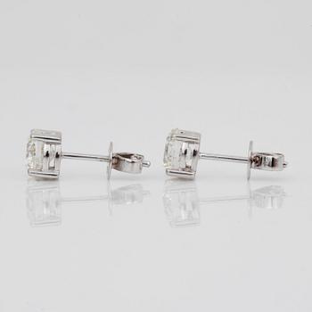 A pair of brilliant-cut diamond earrings, total carat weight 1.82 cts. Quality H/SI2.