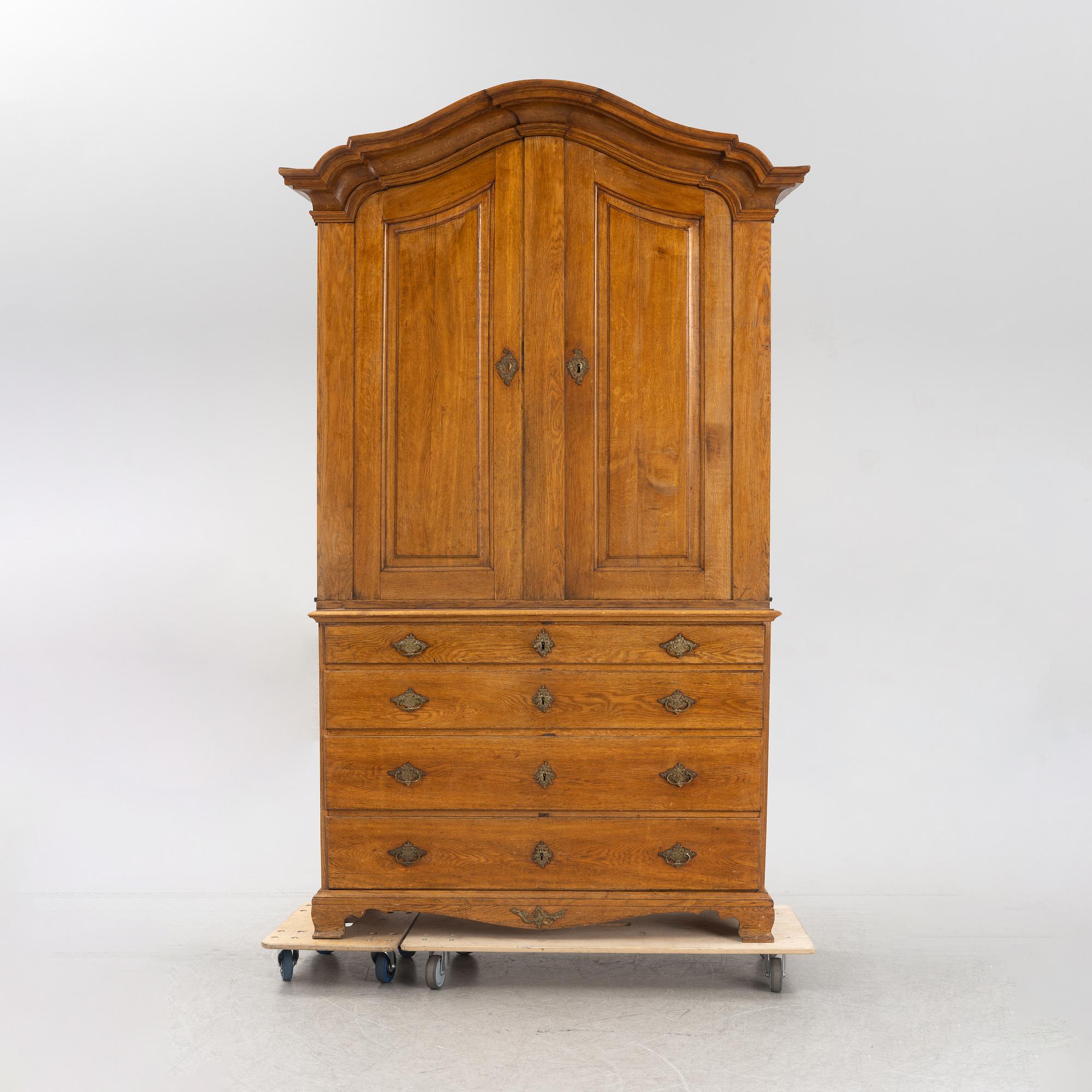 A Rococo cabinet, later part of the 18th Century.