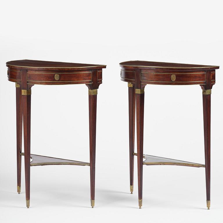 A pair of late Gustavian mahogany consoles in the manner of A. Lundelius, Stochkolm, late 18th century.