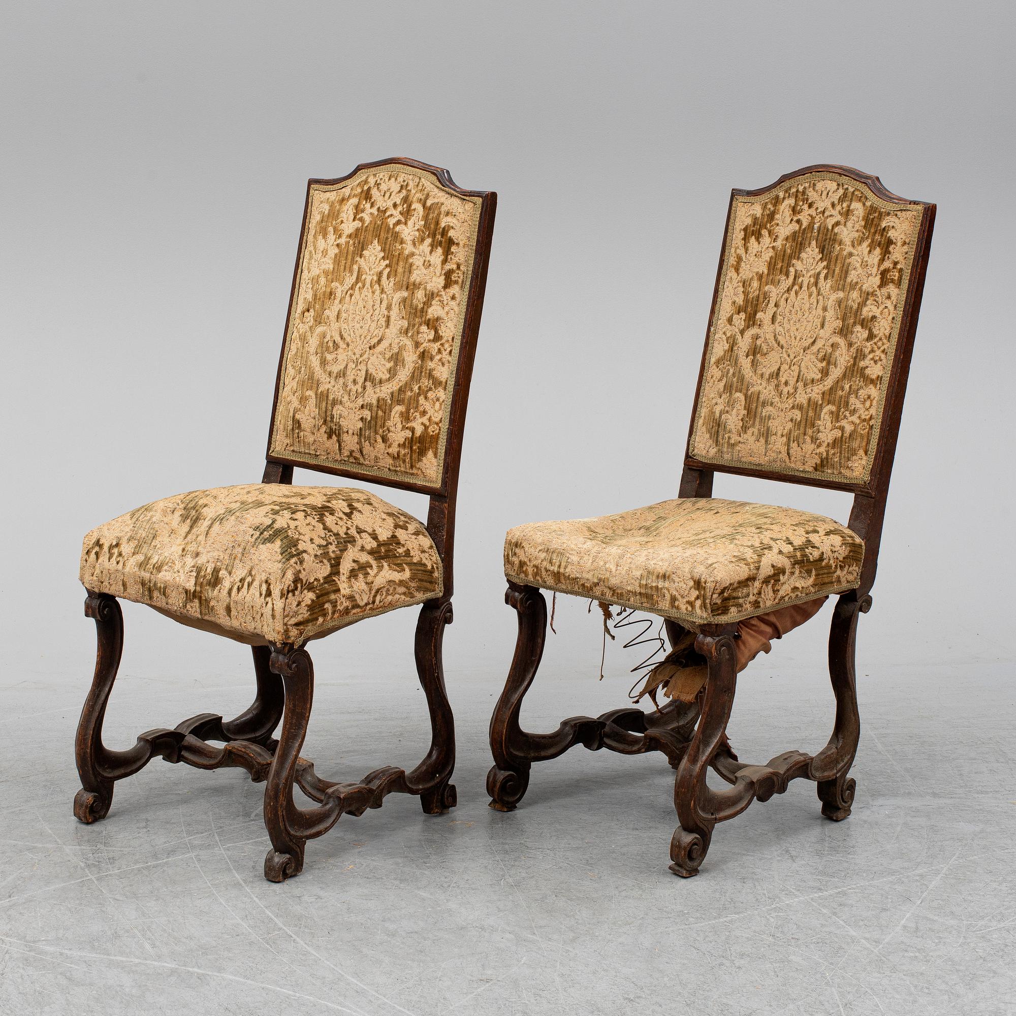 A pair of 18th century chairs.