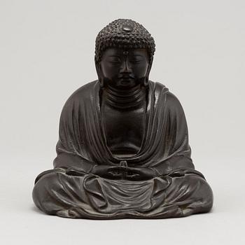 A Japanese seated bronze okimono of Amitabha buddha, 20th century.