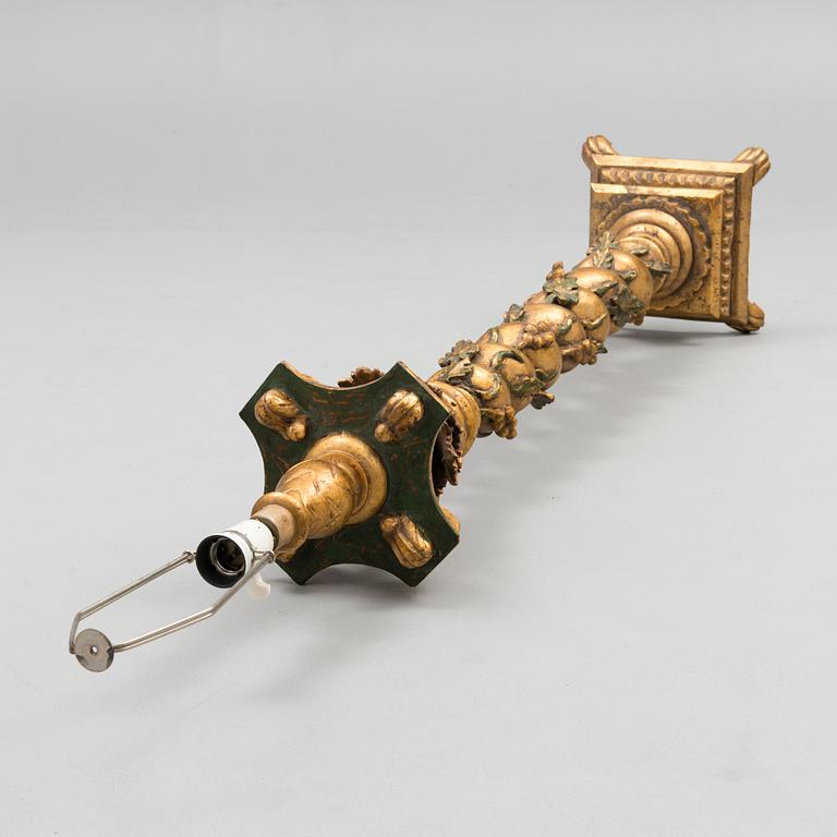 A Baroque style 1920s standard lamp.