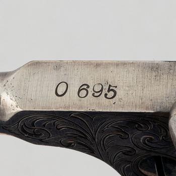 A percussion revolver, Colt 1851 Navy, in case, from the year 1863.