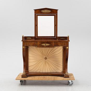 An Empire style dressing table by Johan Öman, Stockholm (1815-33), dated 1827.