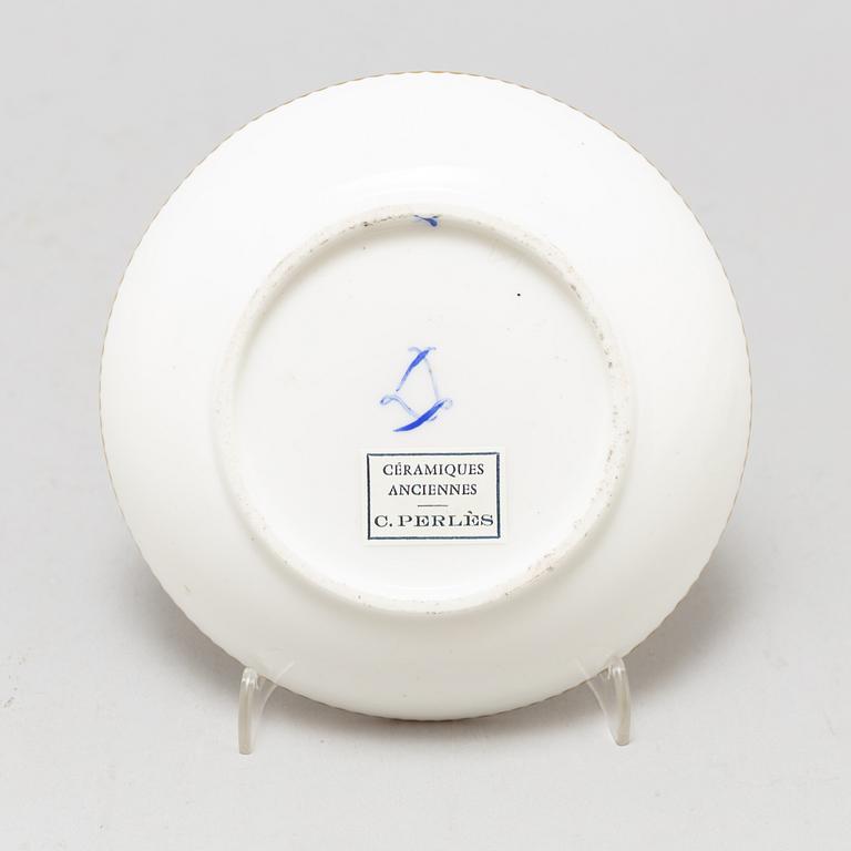 A pair of cups and saucers, "Sévrès"like mark, 19th century.