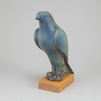 GUNNAR NYLUND, a stoneware sculpture of a falcon, Rörstrand mid 20th century.