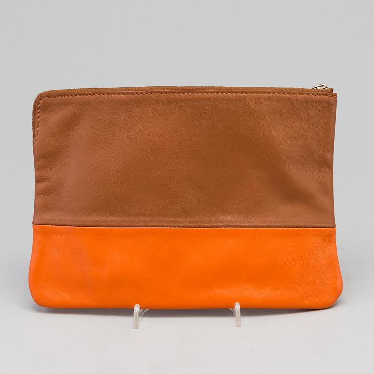 A leather Céline clutch.