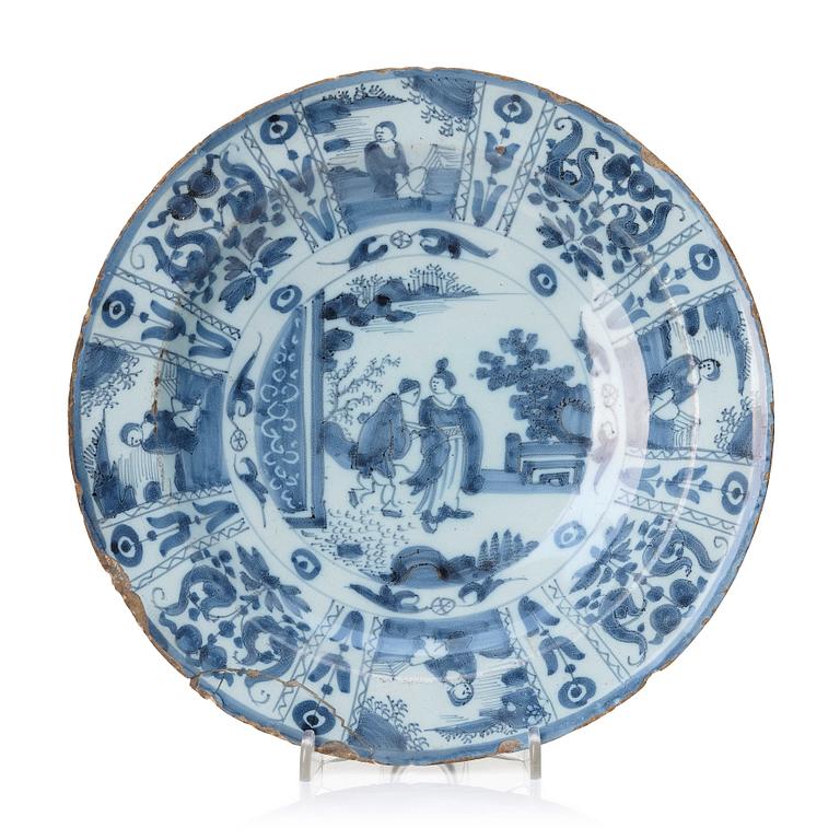 A Dutch faience dinner plate, late 17th Century.