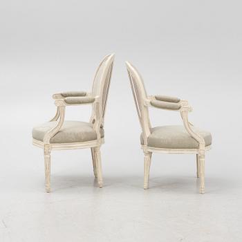 Two similar Louis XVI armchairs, France, late 18th century.