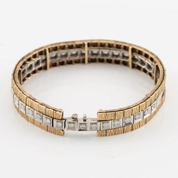 Bracelet in 14K gold and white gold with brilliant-cut diamonds.
