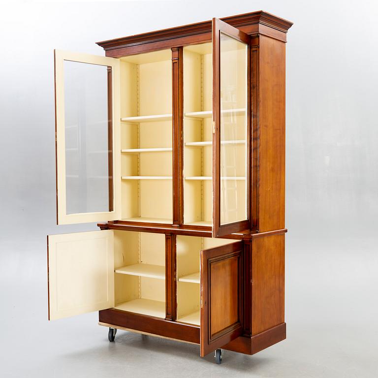 A modern mahogany display cabinet.