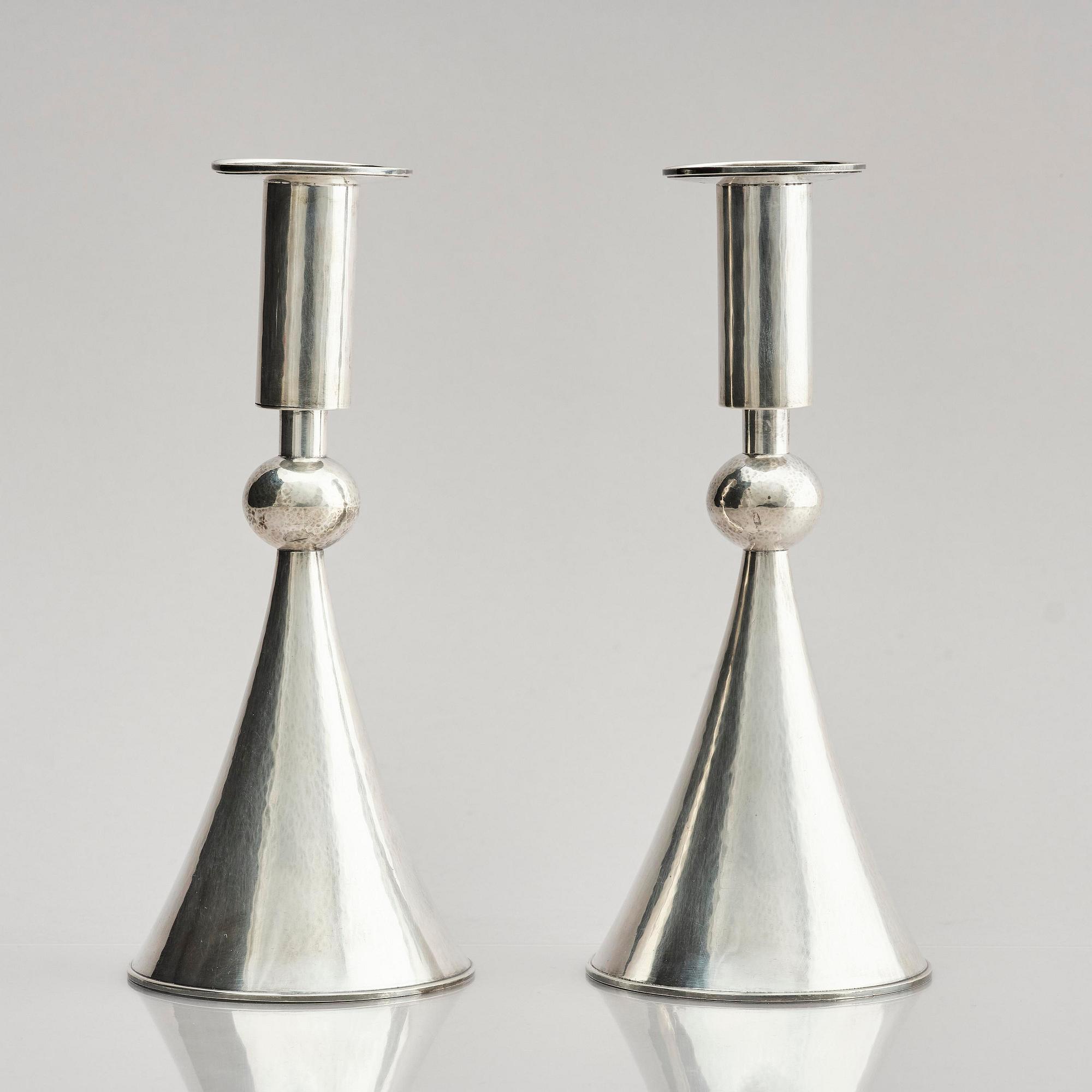 A pair of Swedish sterling silver candlesticks, marks of Sigurd Persson, Stockholm 1959.