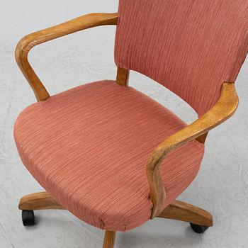 A Swedish Modern mid 20th century office chair.