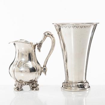 A Swedish silver beaker and a jug, including CG Hallberg, Stockholm 1927.